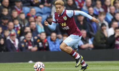 Burnley winger Manuel Benson sprints down the wing during a match.
