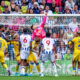 Players from Leeds United and West Bromwich Albion in action during a football match.