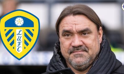 Leeds United manager Daniel Farke next to a Leeds badge